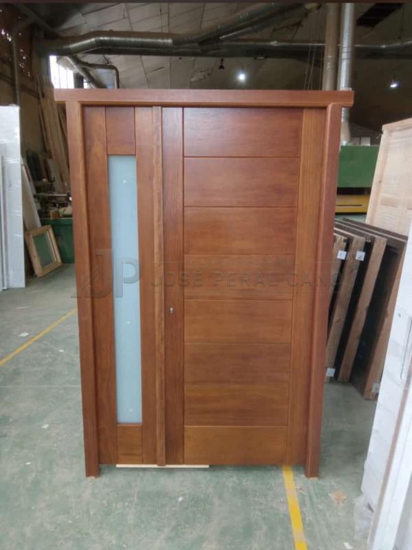 Puerta de Entrada Moderna de Iroko a Medida | Fijo Abatible con Cristal – Trabajo Realizado Puerta de Entrada Moderna de Iroko a Medida | Fijo Abatible con Cristal – Trabajo Realizado